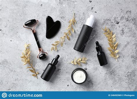 Face Skin Care Concept Obsidian Stone Face Roller Gua Sha Black