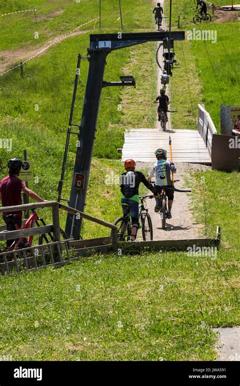 Offroad Mountain Bikers Using The Kletterwald Skilift To Take Them