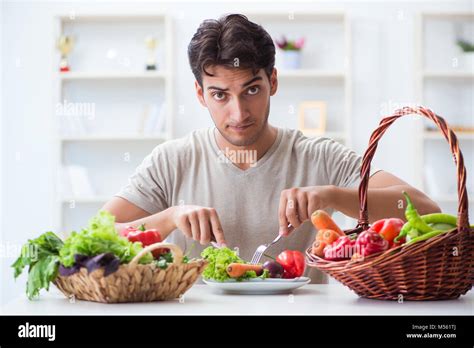 Young Man In Healthy Eating And Dieting Concept Stock Photo Alamy