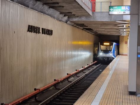 Metro Train Arriving At Aurel Vlaicu Metro Station Of The Subway System