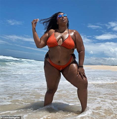 Lizzo poses in a red bikini following first-ever performance in Brazil ...