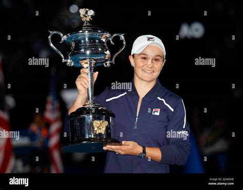 Australian Tennis Player Ashleigh Barty Poses With The Championship