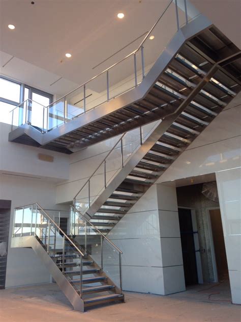 Stainless steel, glass stair & landing balustrade - Stairs Etc.