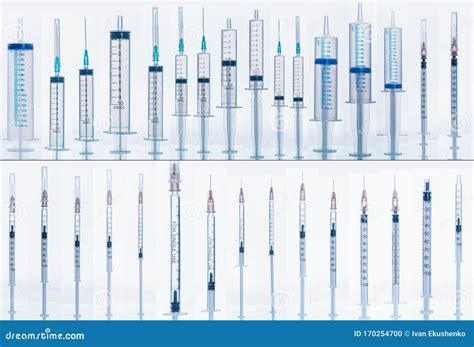 Medical Syringe with Needle Isolated on White, Macro. Many Different ...