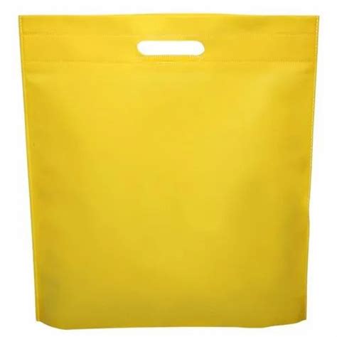 Plain Yellow D Cut Non Woven Carry Bag Capacity 1 5 Kg At ₹ 125 Kg In