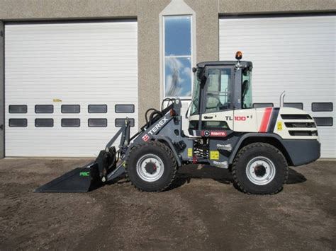 Погрузчик Terex TL 100. Технические характеристики, цены и аналоги