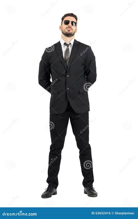 Secret Agent Or Guard With Hands Behind Back Wearing Sunglasses Stock