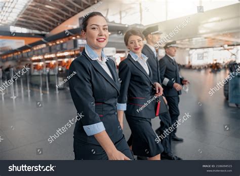 Two Flight Attendants Pilots Walking Through Stock Photo 2186094515