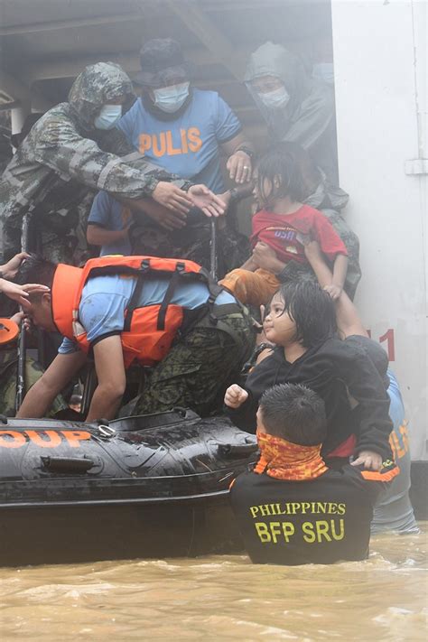 Look Marikina Residents Seek Higher Ground Amid Major Flooding Caused