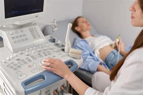 Premium Photo Selective Focus Doctor Doing Ultrasound Of Fetus To