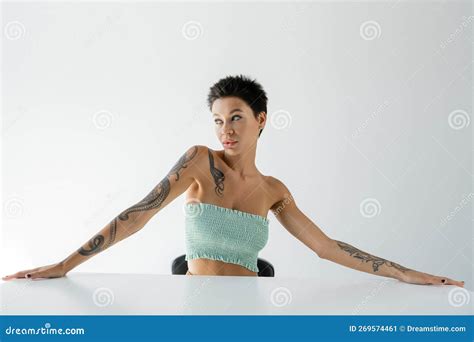 Tattooed Woman In Strapless Top Stock Image Image Of Brunette Grey