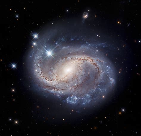 Hubble Captures Majestic Barred Spiral | Against an inky bla… | Flickr