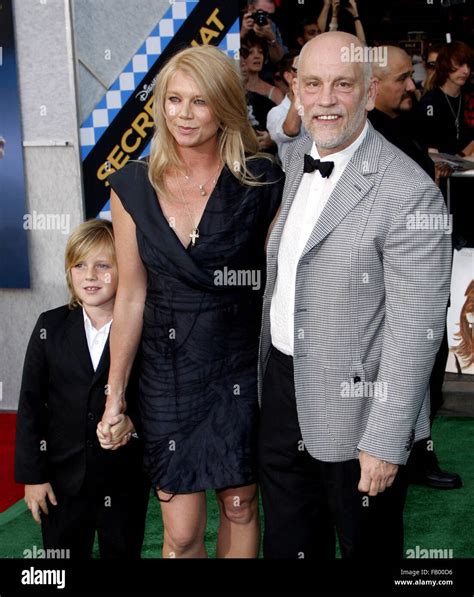 John Malkovich and Peta Wilson at the Los Angeles premiere of ...