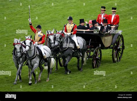 The Royal Procession Arrives With Queen Elizabeth Ii And The Duke Of