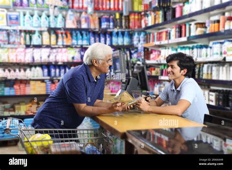 Grandpa Shopping In Supermarket Standing On Billing Counter Old White Hair Grandfather Showing