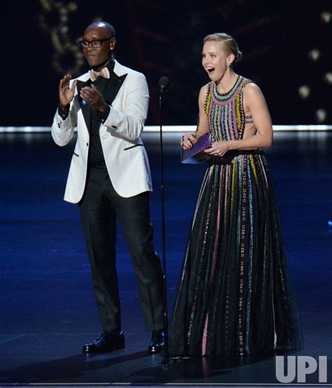 Photo: Don Cheadle and Kristen Bell present at Primetime Emmy Awards in Los Angeles ...