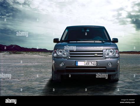 Car on beach Stock Photo - Alamy