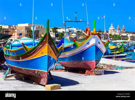 Traditional Fishing Boats Luzzu In Malta In Marsaxlokk Village Stock