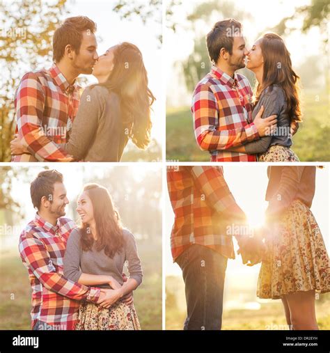 Young Couple In Love Walking In The Autumn Park Holding Hands Looking