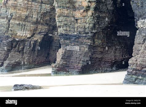 Close up of the cliffs and caves of the As Catedrais beach (Cathedrals ...