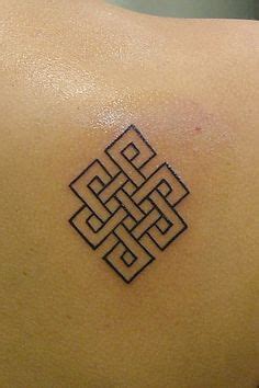 The design is an endless knot, a Buddhist symbol that represents the ...