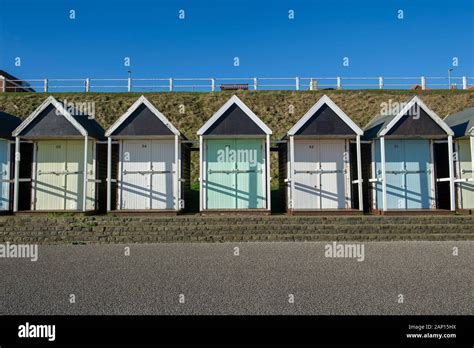 Traditional Beach Huts Along The Promenade At Bridlington East