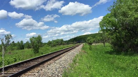 Freight green train traveling on the railroad Stock Video | Adobe Stock