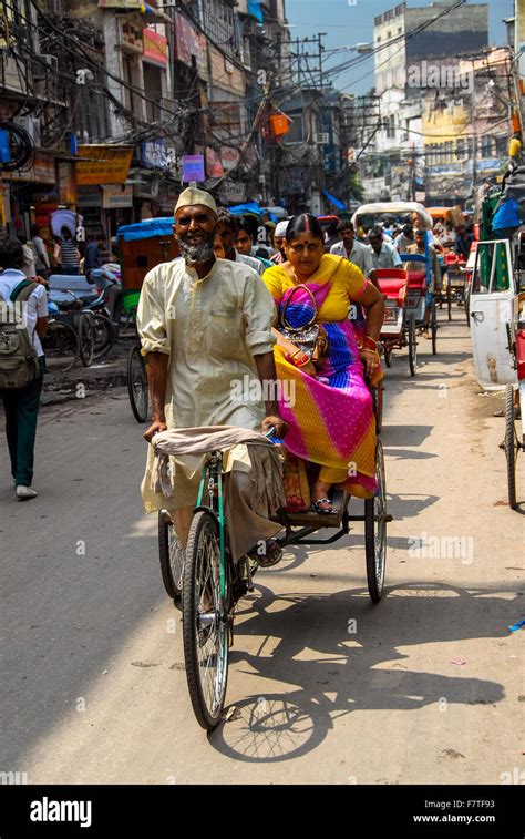 Heavy Load At Rickshaw In New Delhi India Stock Photo Alamy