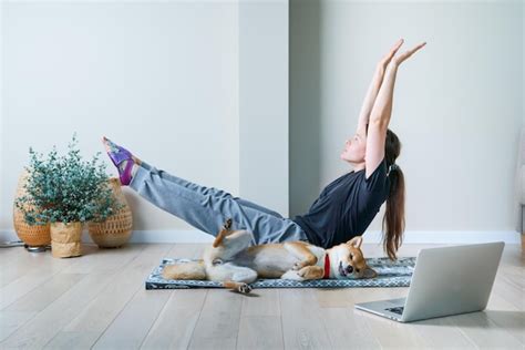 Premium Photo Doga Is The Practice Of Yoga As Exercise With Dogs