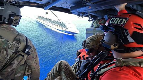 Air Force PJs hoist onto cruise ship to rescue sick child