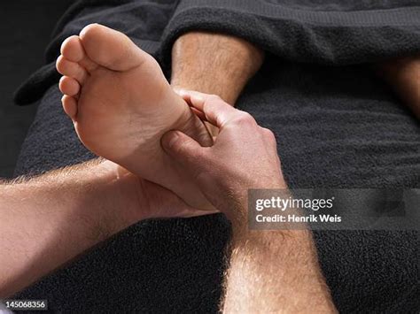 1389 Man Foot Massage Stock Photos High Res Pictures And Images