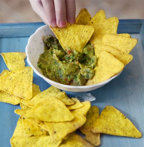 Nachos Corn Chips With Guacamole Sauce Close Up Photo Stock Image