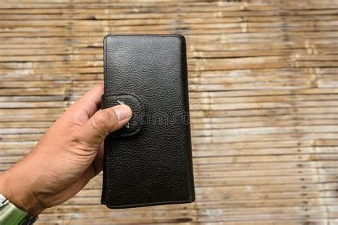 One Hand Holding A Black Leather Wallet Stock Image Image Of Purchase