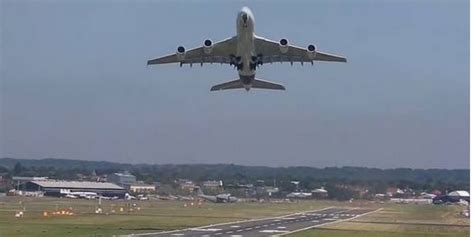 Airbus A380 Near Vertical Takeoff And Airshow Orange And Blue Ana