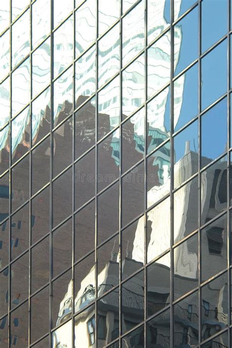 Glass Tower Office Building Exterior Windows Reflecting And Distorting