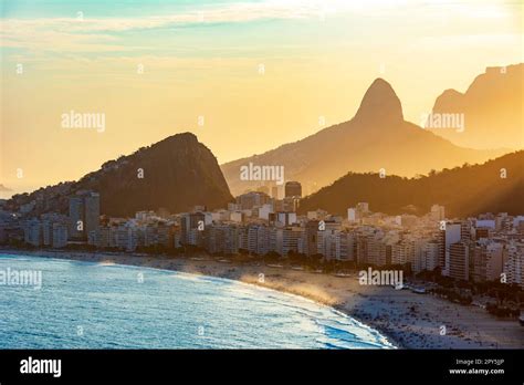 Sunset at Copacabana beach in Rio de Janeiro Stock Photo - Alamy