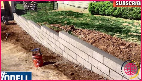 Comment construire un petit mur de soutènement avec des blocs de béton