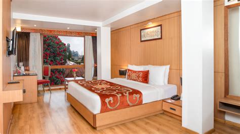 Deluxe Room With Lawn View Summit Swiss Heritage Hotel And Spa