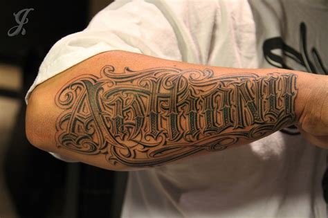 Johnny Opina: LOWRIDER TATTOO STUDIOS