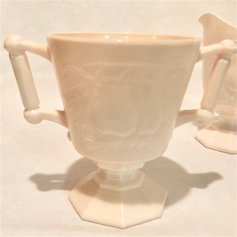 Pink Milk Glass Footed Cream And Sugar Set With Raised Pear Fruit Pattern