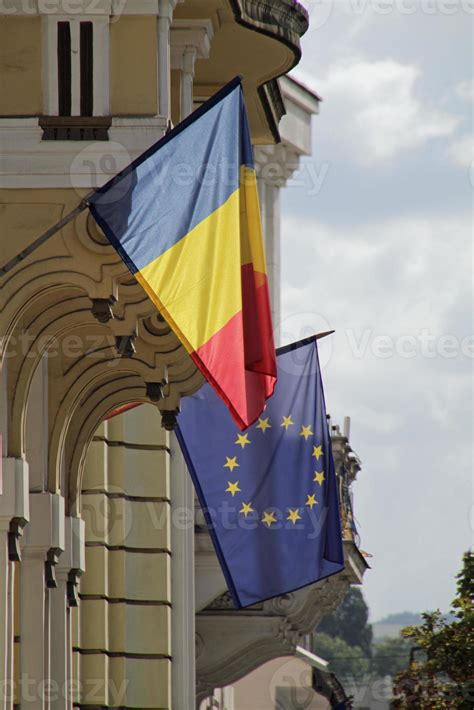 Romanian flag and EU flag in the sun 10307007 Stock Photo at Vecteezy