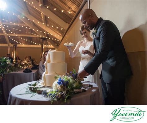 Bride And Groom Cut The Cake At Tenaya Lodge Wedding Yosemite Wedding