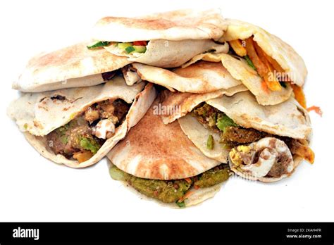 Traditional Egyptian popular breakfast street sandwiches of mashed fava ...