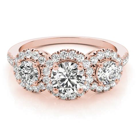 Three Stone Engagement Ring With Round Diamonds In Rose Gold And White