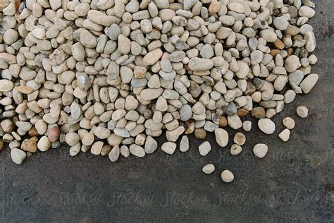 "Stones In Driveway" by Stocksy Contributor "Raymond Forbes LLC" - Stocksy