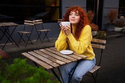Free Photo Woman Drinking Hot Chocolate At Cafe