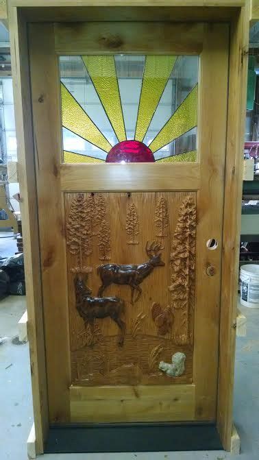 Knotty Alder Door With Stained Glass And Carved Deer Panel Custom Wood Doors Custom