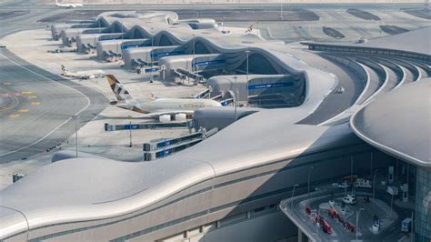 Kpf Tops Abu Dhabi Airport With Undulating Roof Informed By Sand Dunes Construction Supply