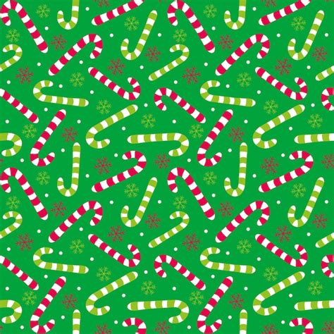 Premium Vector Candy Cane And Snowflakes With Green Background