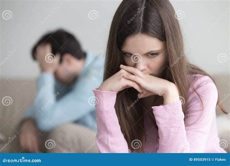 Upset Young Couple After Arguing Sad Thoughtful Woman Looking W Stock